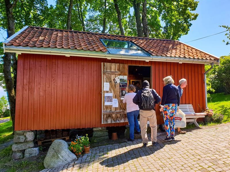 Visitors look in the studio at Munch's house
