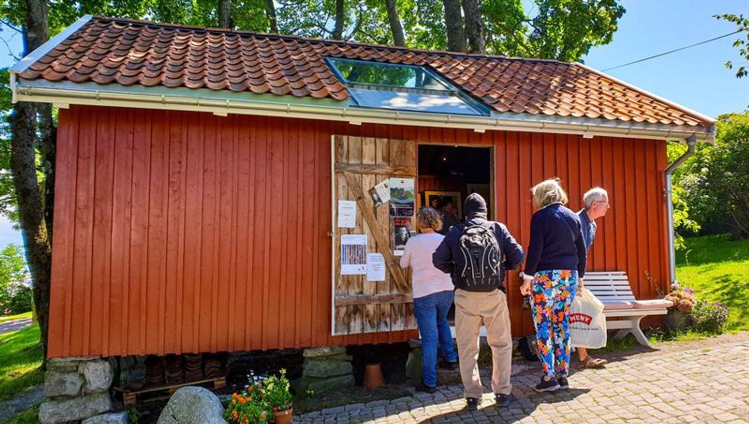 Visitors look in the studio at Munch's house