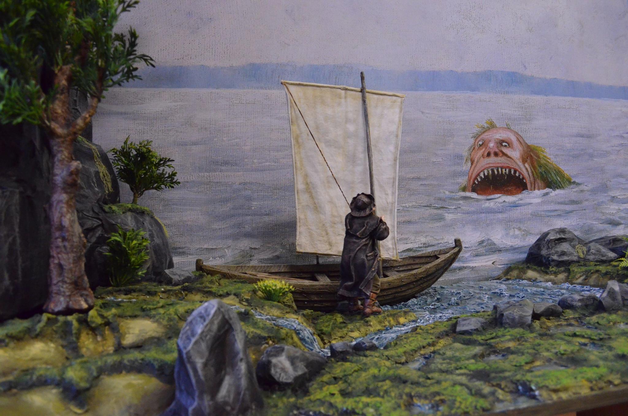 sjøtroll i havet og man med båt