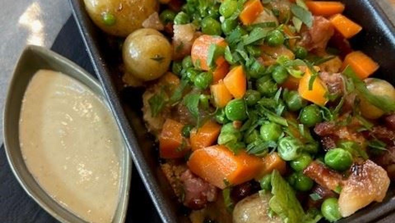 Fish gratin served with vegetables and potatoes