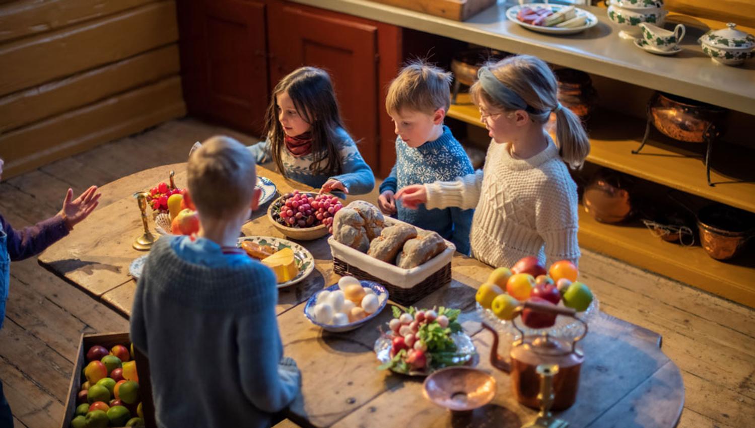 children in the kitchen of Søndre Brekke main farm in Skien