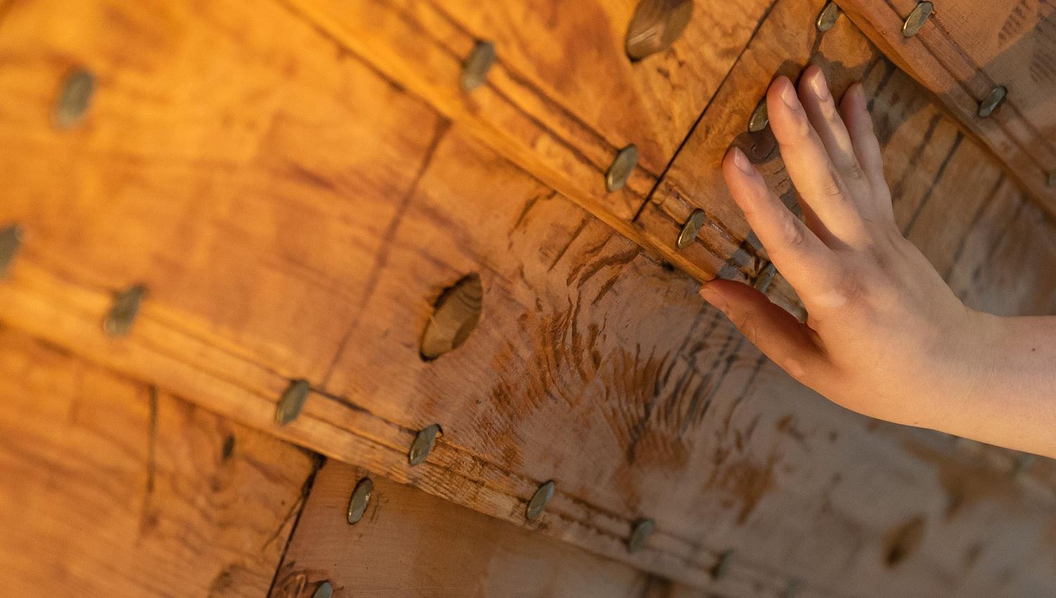 Close-up of detailed woodwork from the reconstruction of the Myklebust Ship.