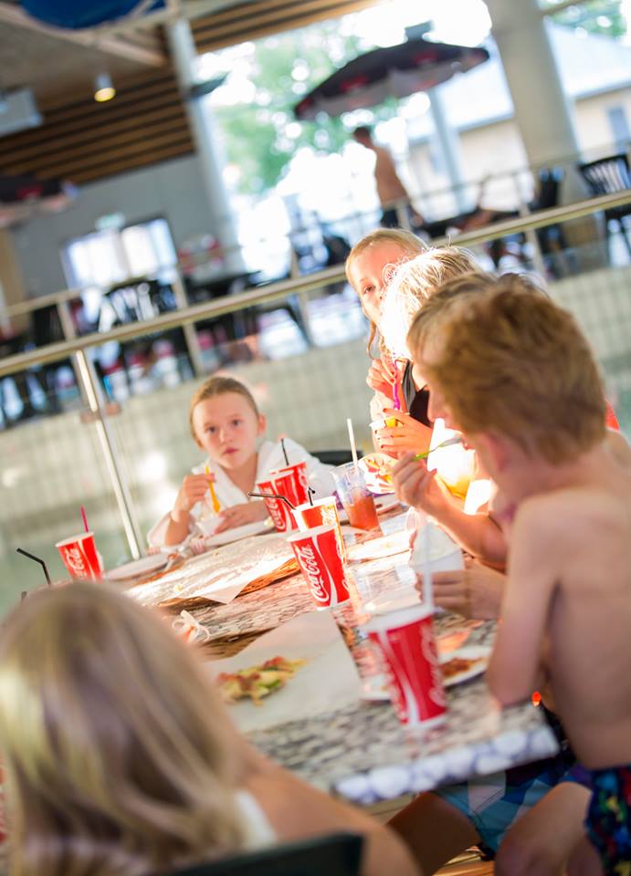 Children eating and drinking