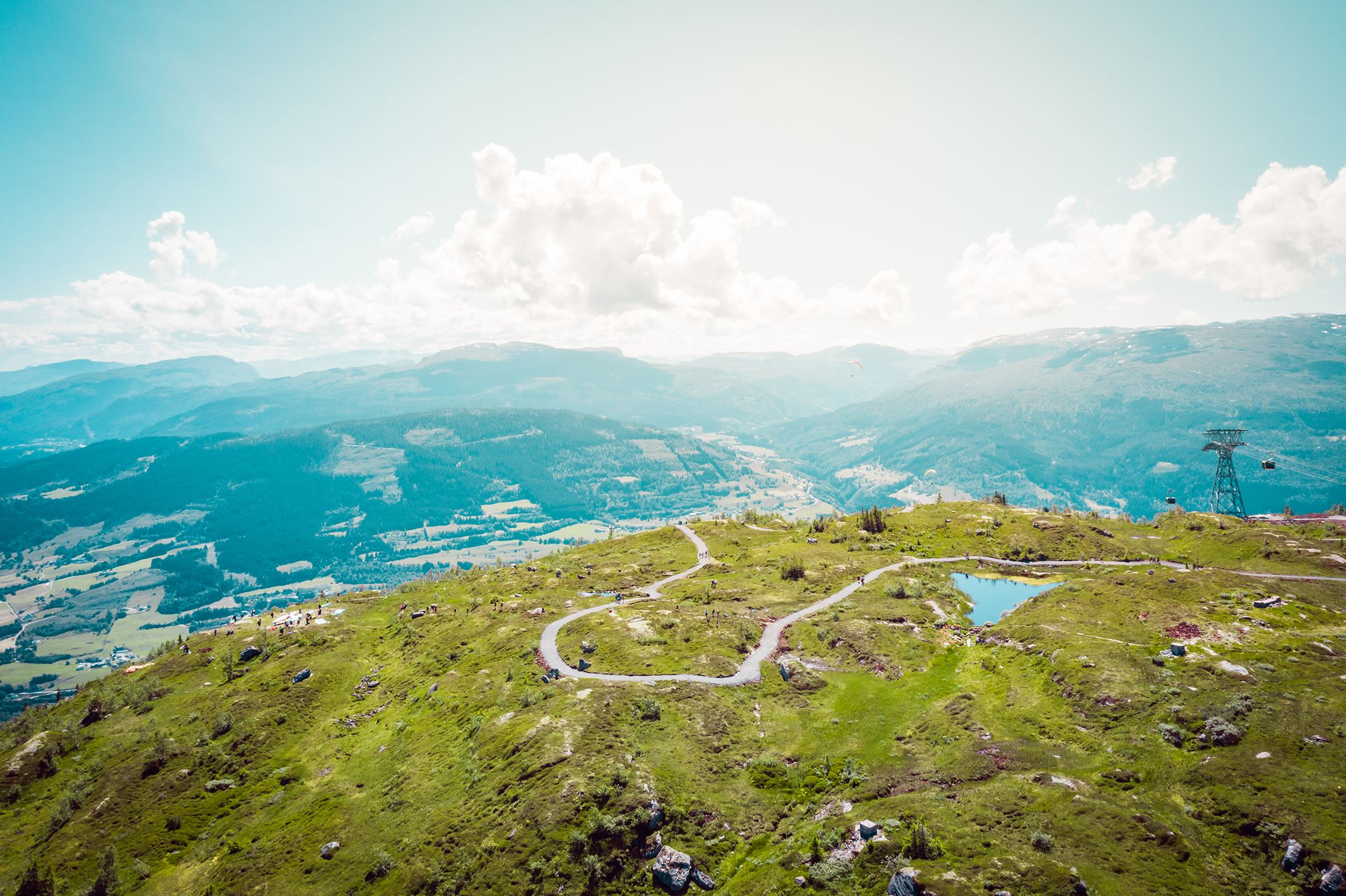 The top of mount Hangur, surrounded by open mountain terrain and panoramic views across the valley.