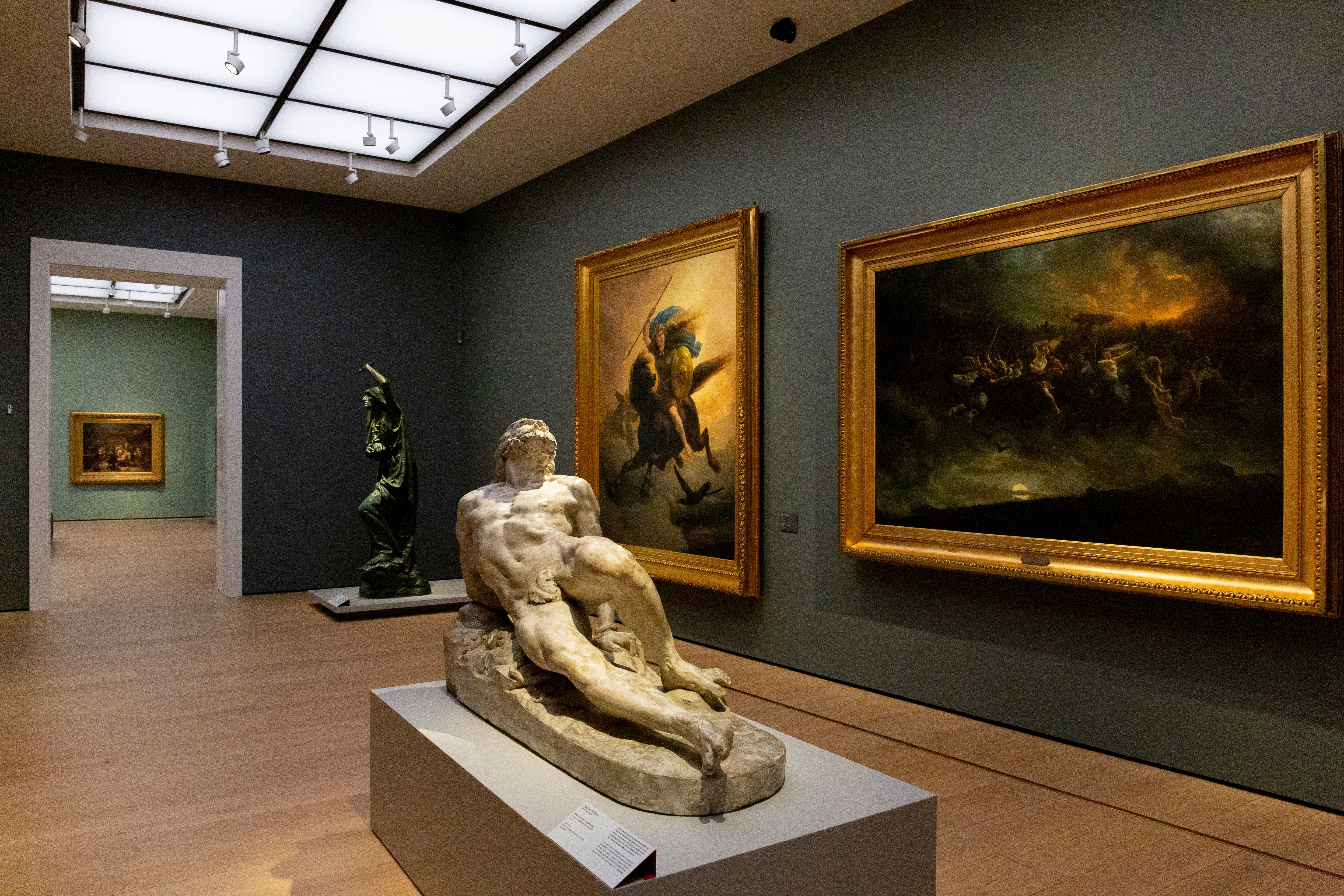 Two sculptures and two paintings in one of the exhibitions.