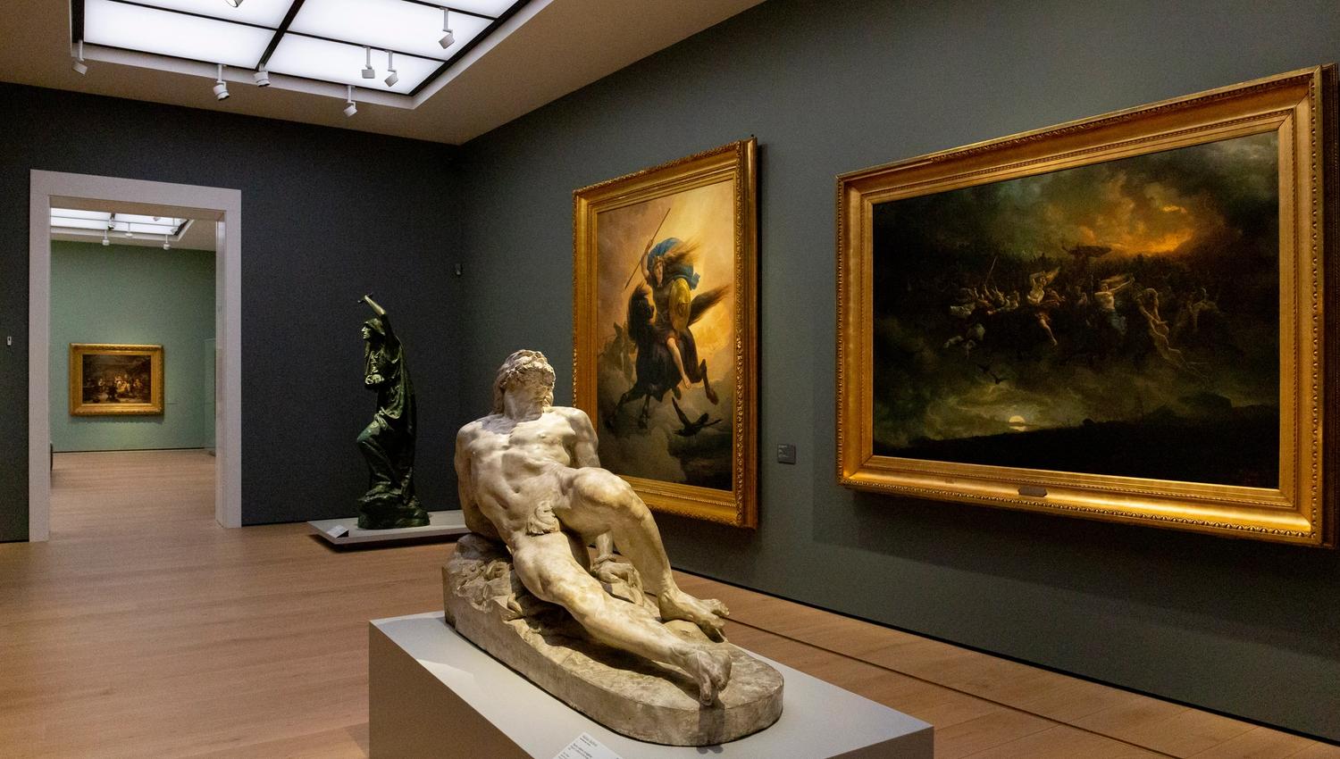 Two sculptures and two paintings in one of the exhibitions.