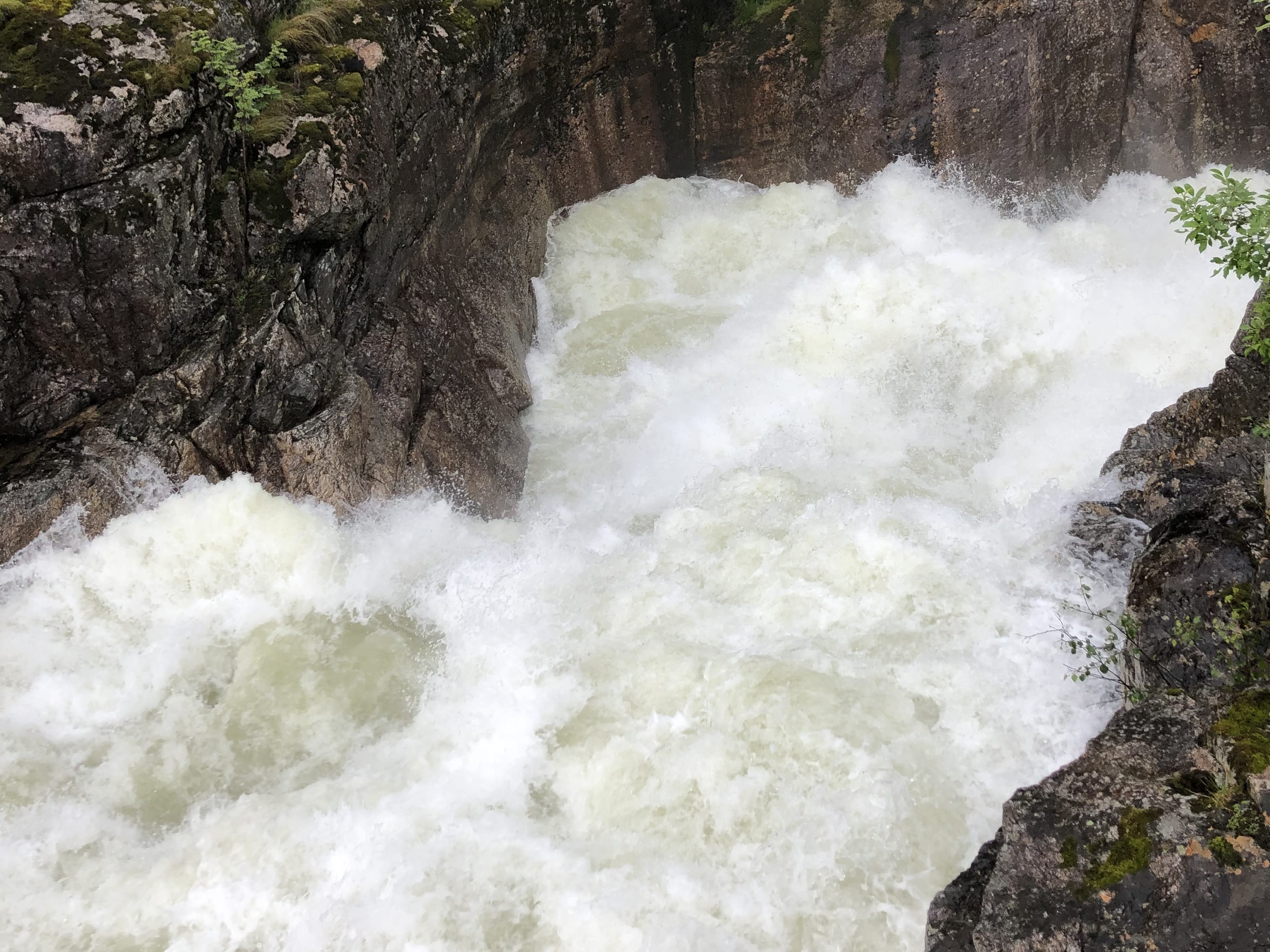 High water flow in the waterfall after heavy rain
