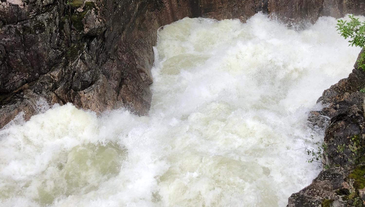 High water flow in the waterfall after heavy rain