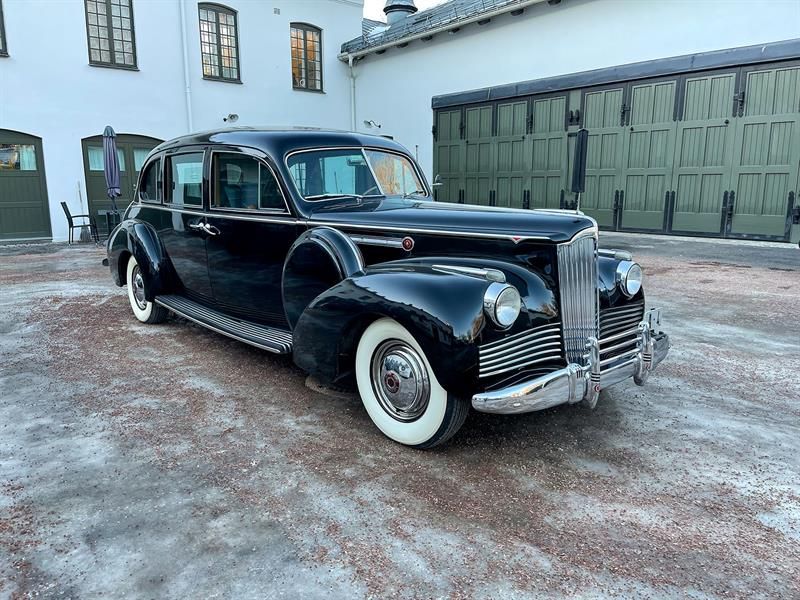 Royal car from 1942 parked outside the stables.
