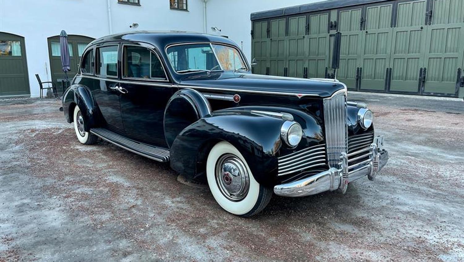 Royal car from 1942 parked outside the stables.