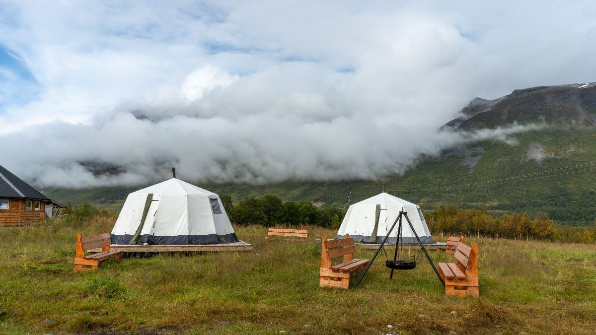 Tromsø Lapland’s Sámi camp surrounded by mountains and Northern Norwegian nature near Tromsø.