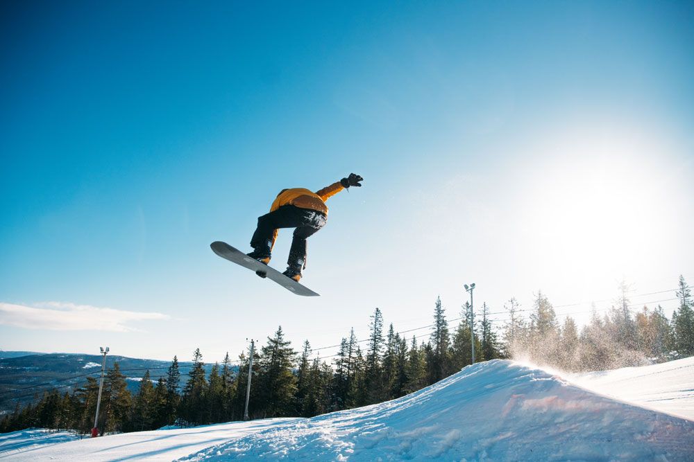 boy snowboarding at Lifjell ski centre