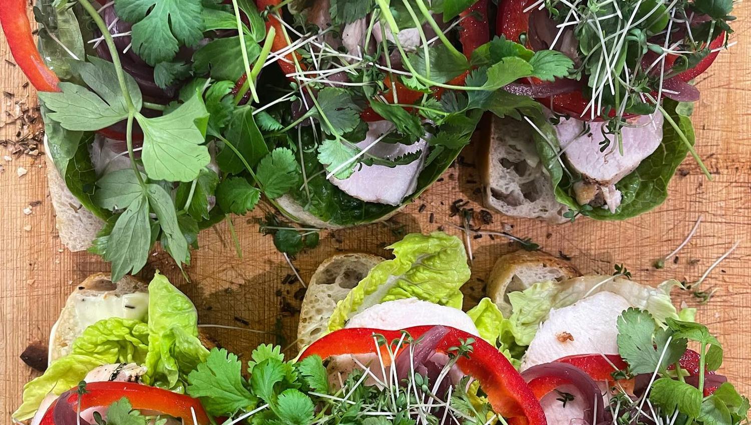 Sandwiches sprinkled with herbs and greens