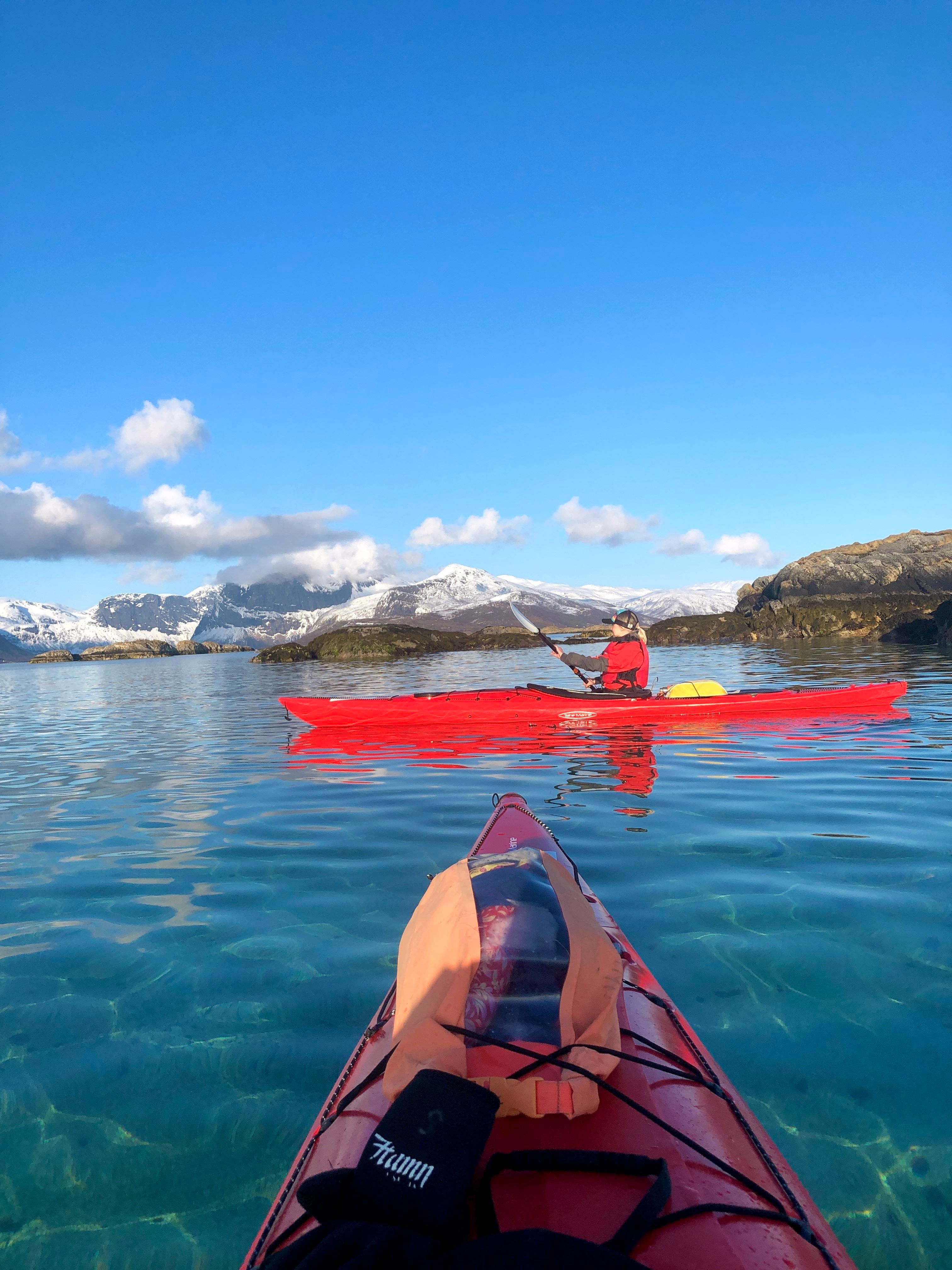 out on the fjord in a kayak