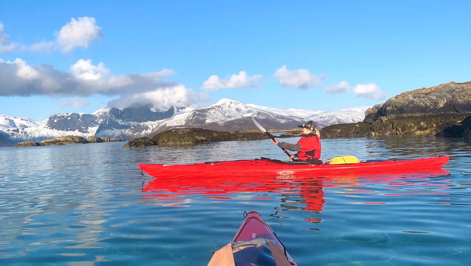 out on the fjord in a kayak