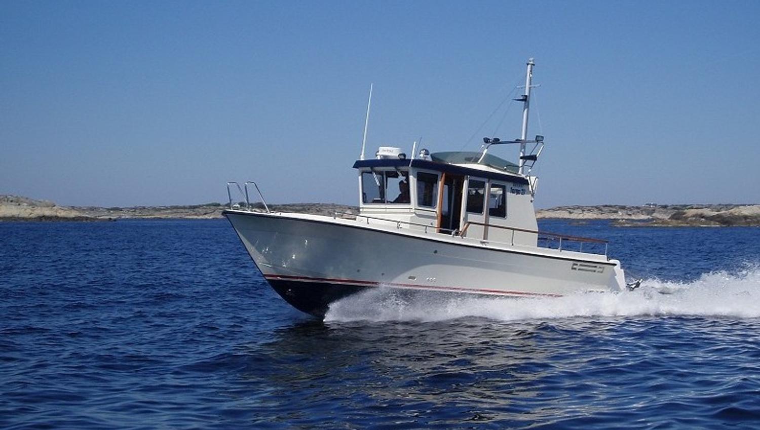Fiskebåt i skjærgården, Hvaler