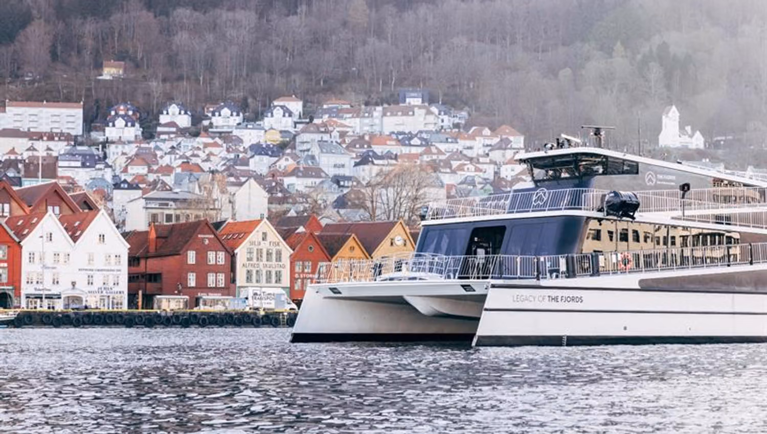 Bergen City Cruise passing in front of Bryggen