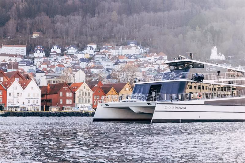 Bergen City Cruise passing in front of Bryggen