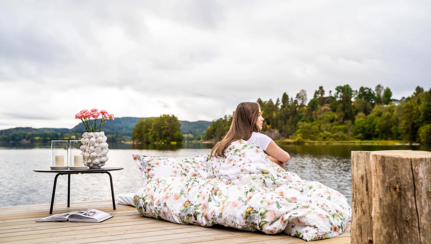 Girl enjoying herself by the water