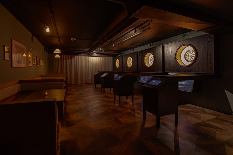 Dart boards and small seating sections