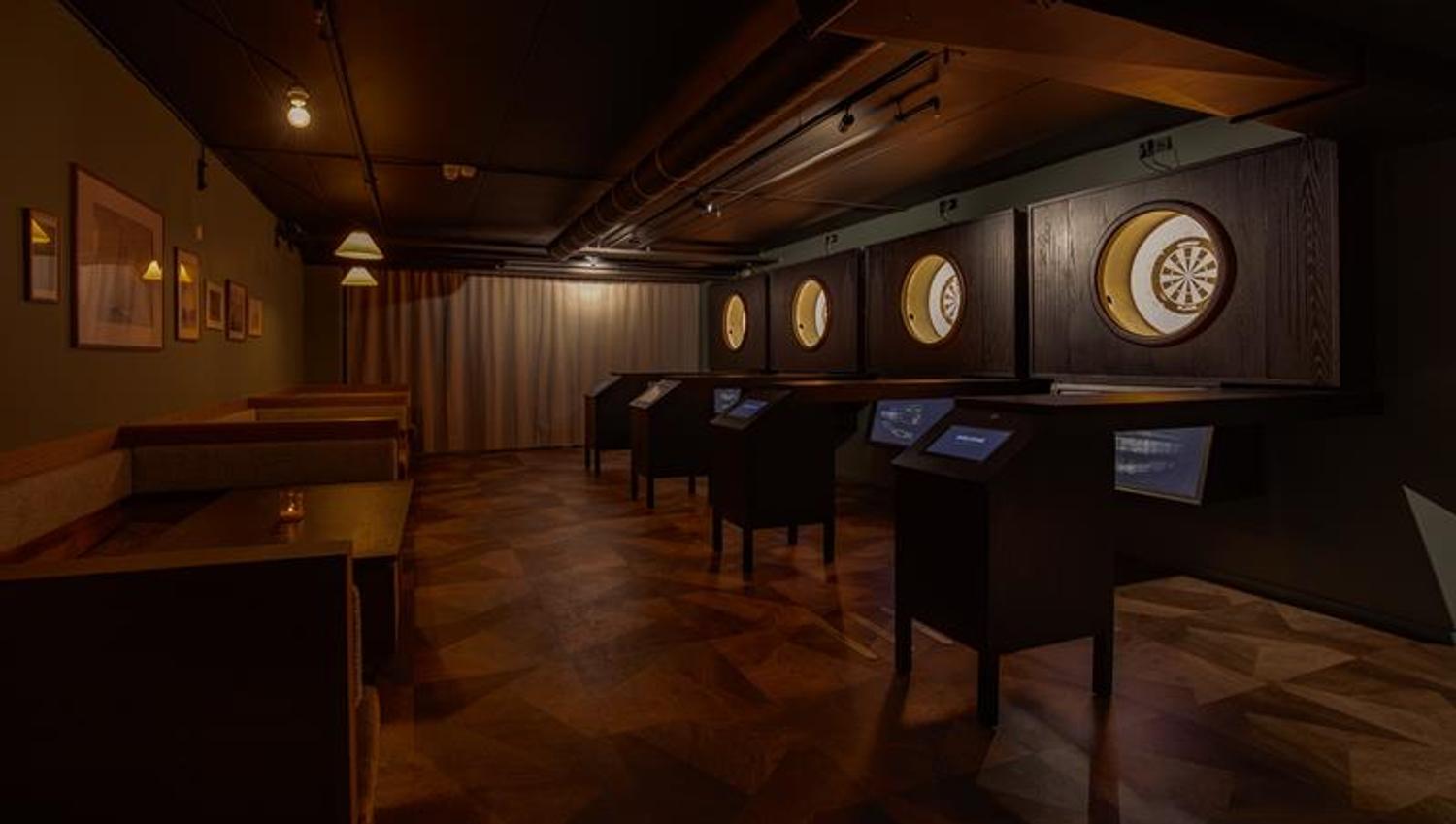 Dart boards and small seating sections