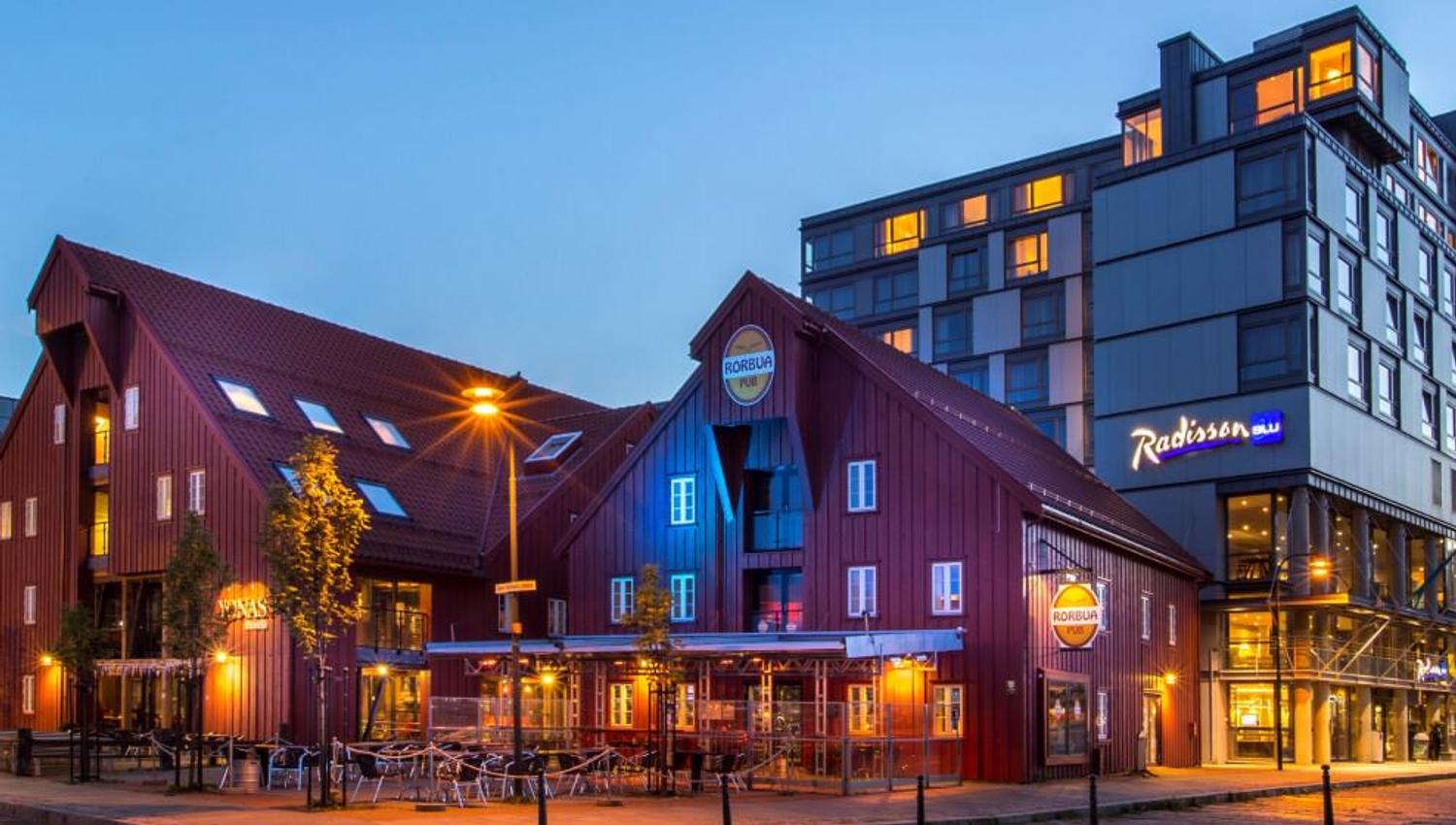 The outside of Radisson Blu Hotel Tromsø, and Yonas Pizzeria