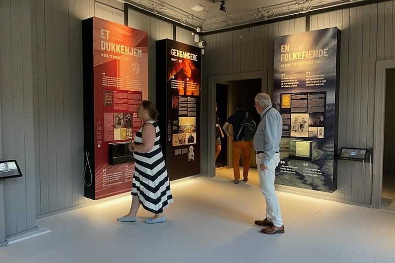 Inside the museum, visitors looking at the exhibiition