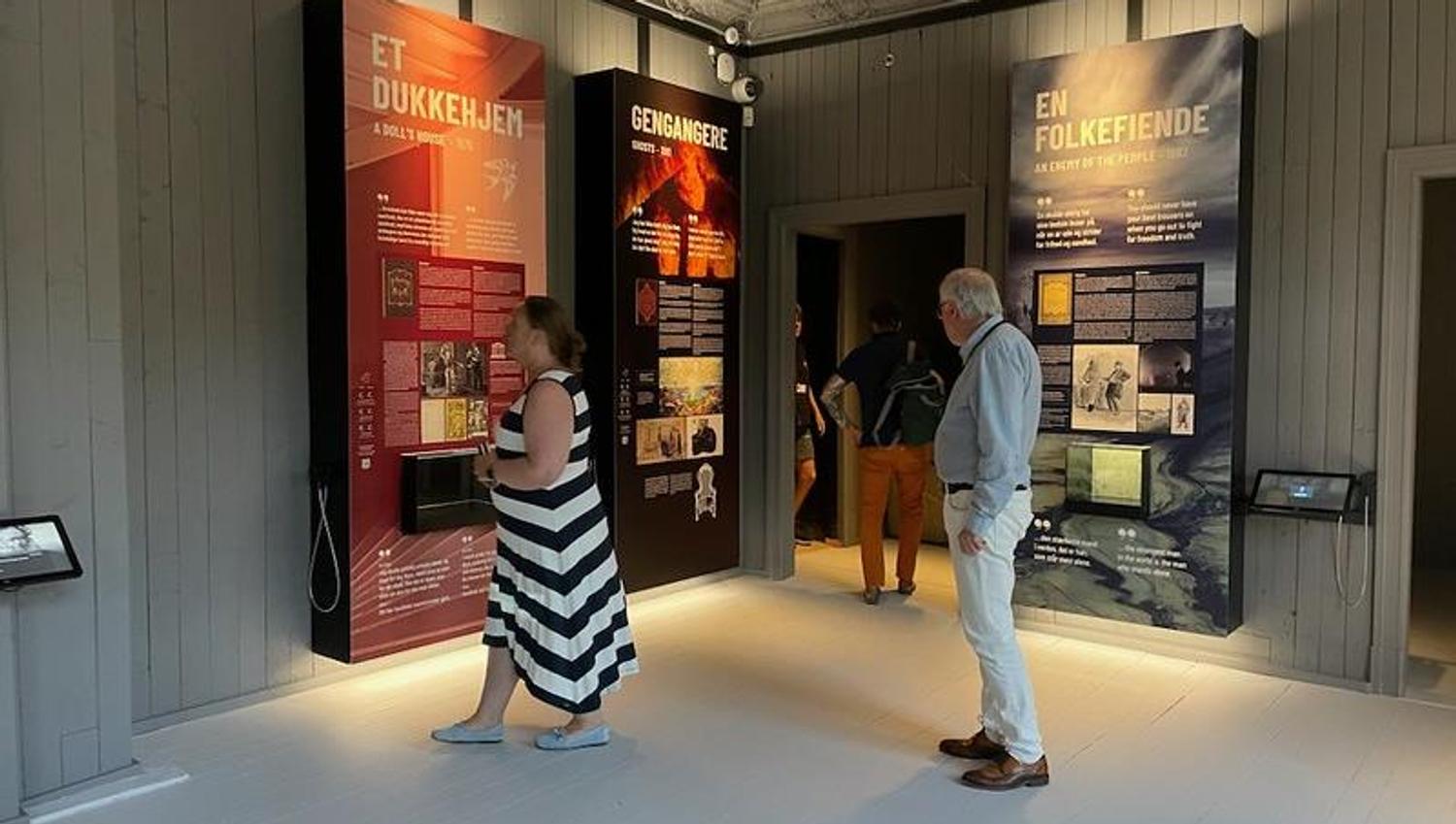 Inside the museum, visitors looking at the exhibiition