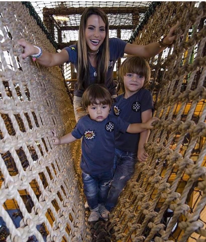 Child and mother play in playland