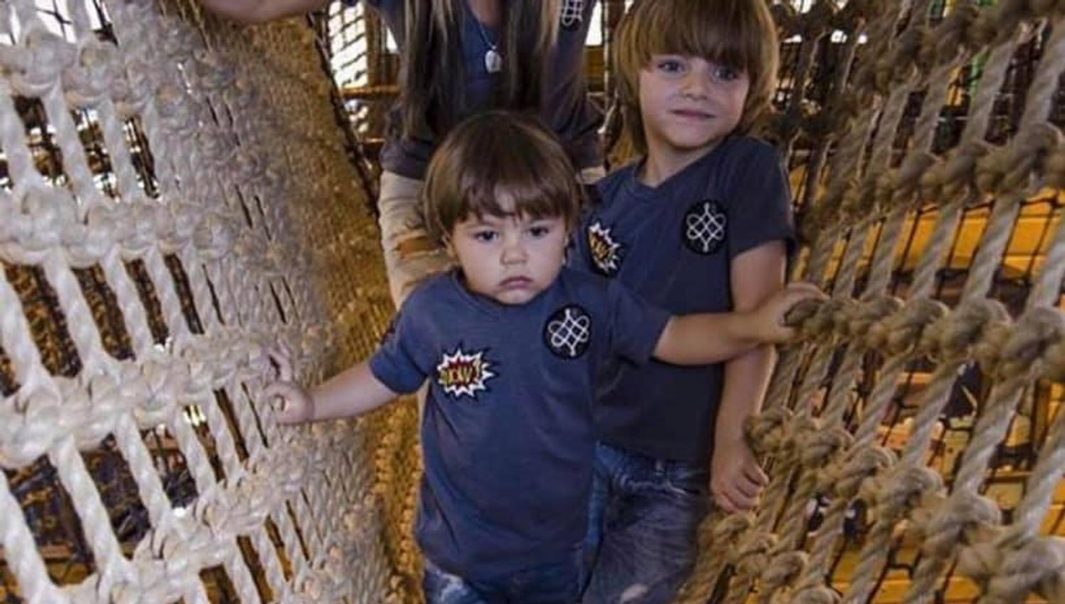 Child and mother play in playland
