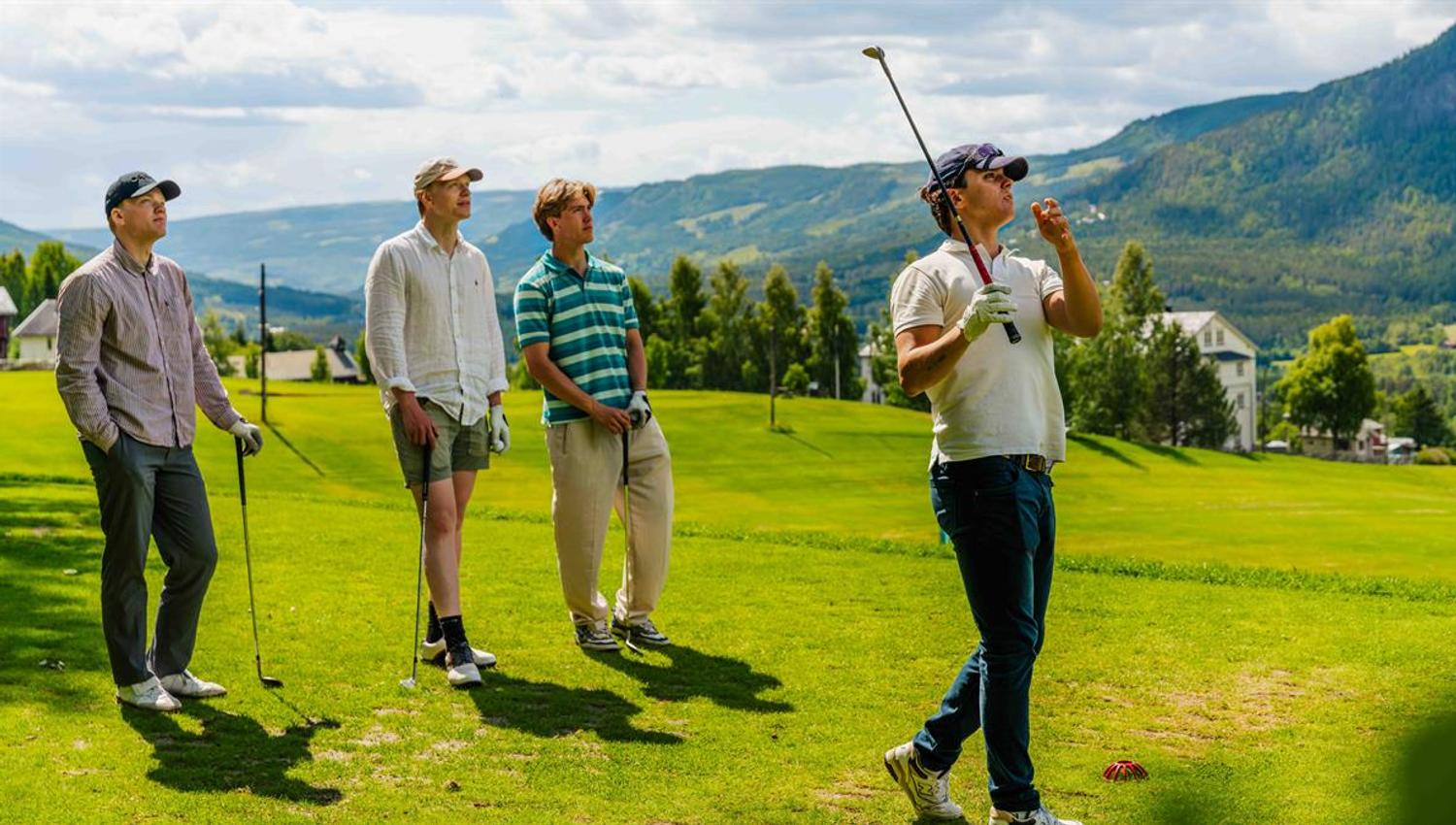 Group of golfers on the course.