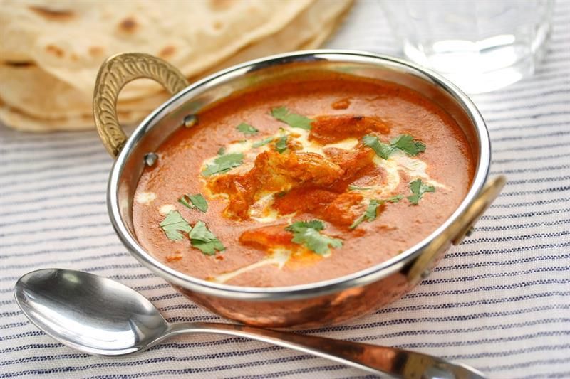 Detalj av butter chicken.