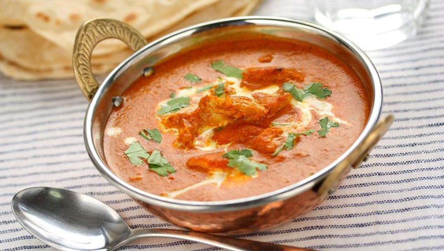 Detalj av butter chicken.