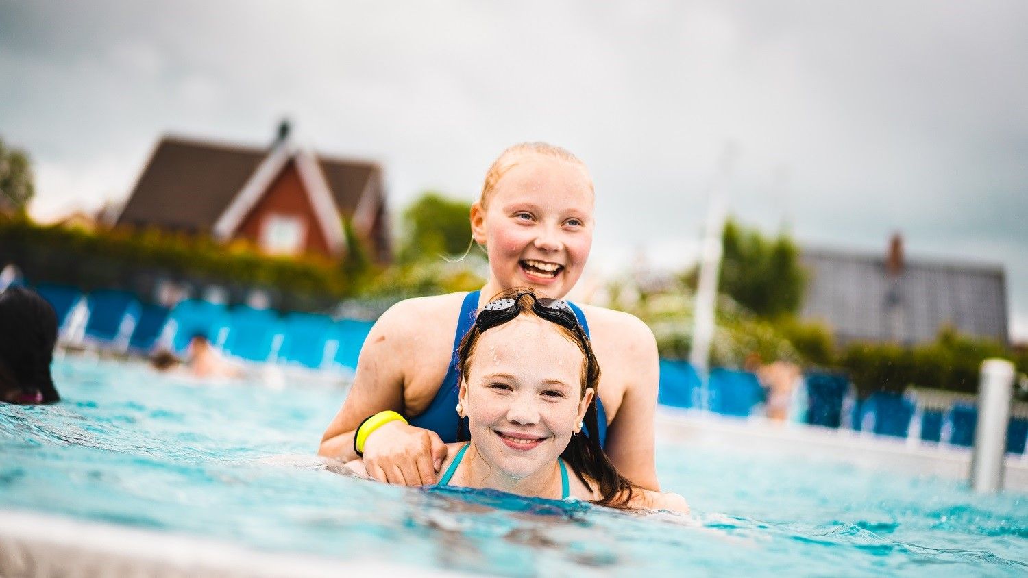 Two girls smiling