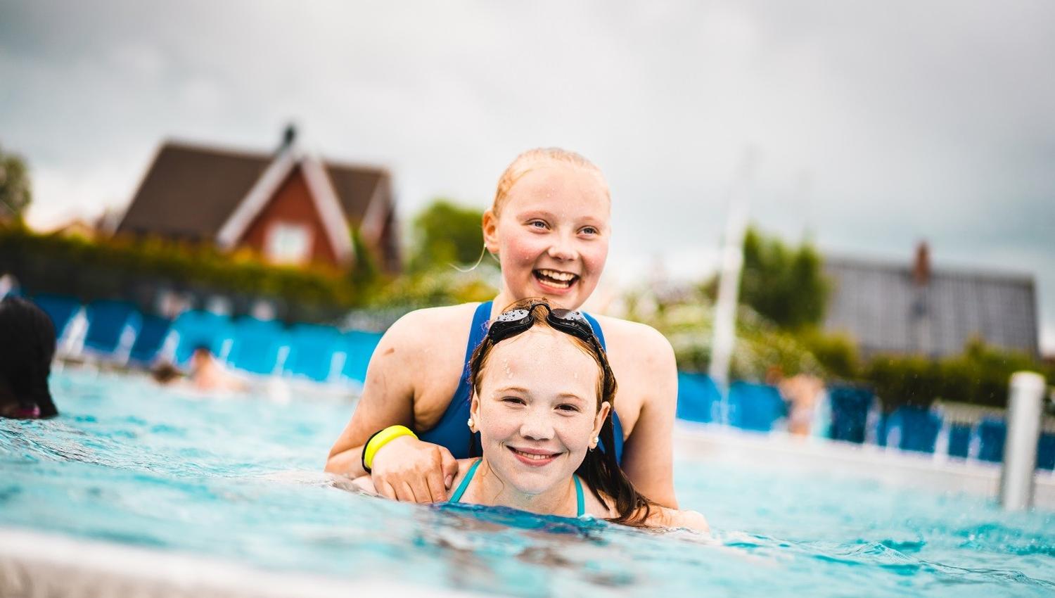 Two girls smiling