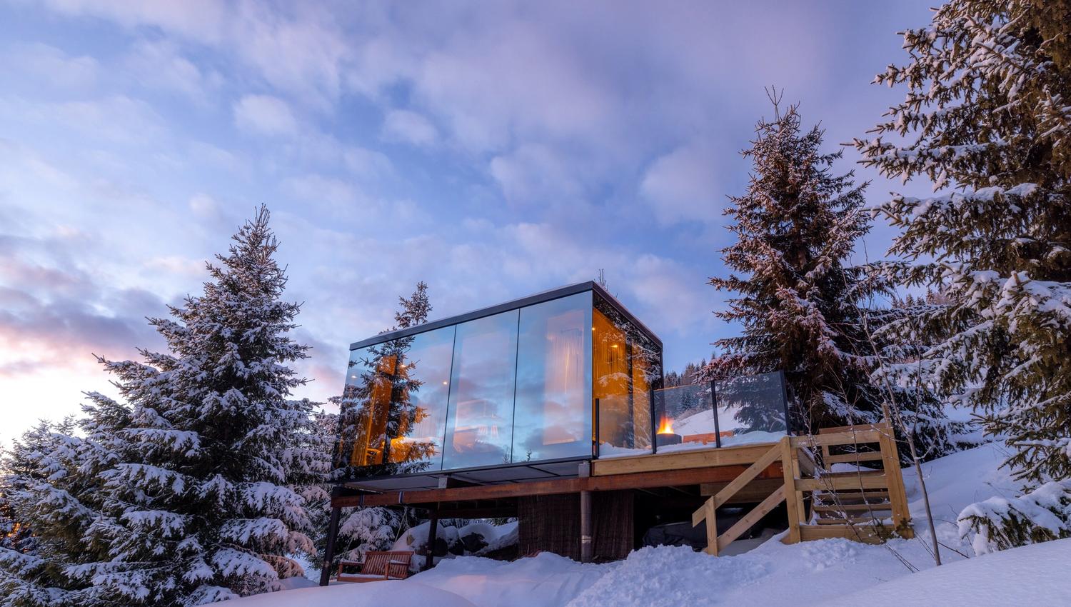 View of the mirror cabin during winter