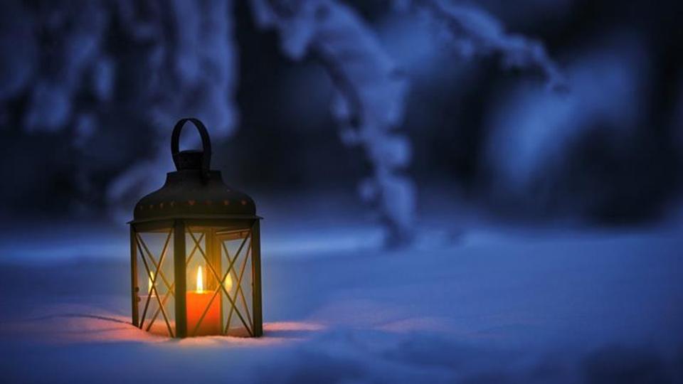 Poster for the event - a lantern in the dark