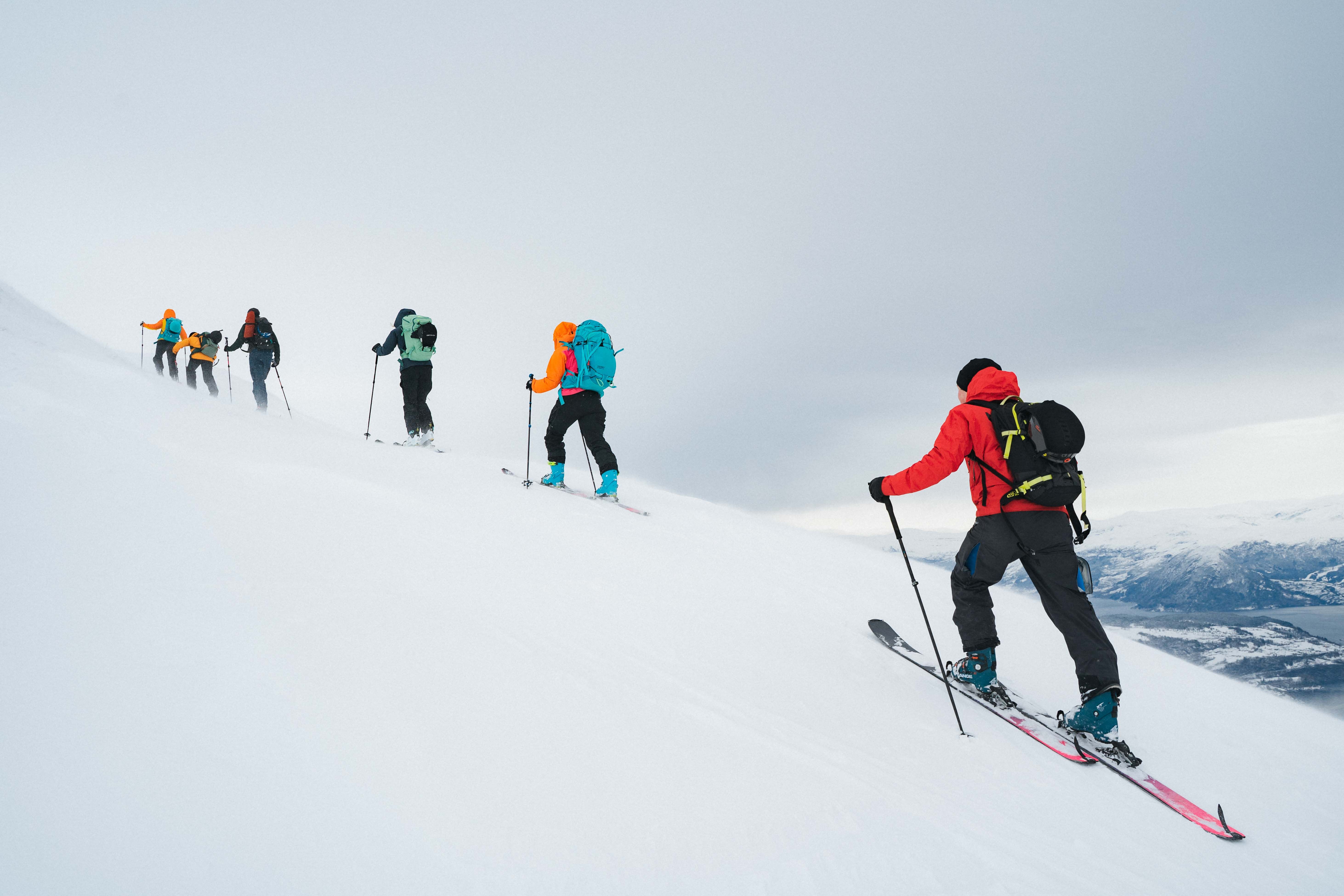 Six people randoneeing/ski touring. 