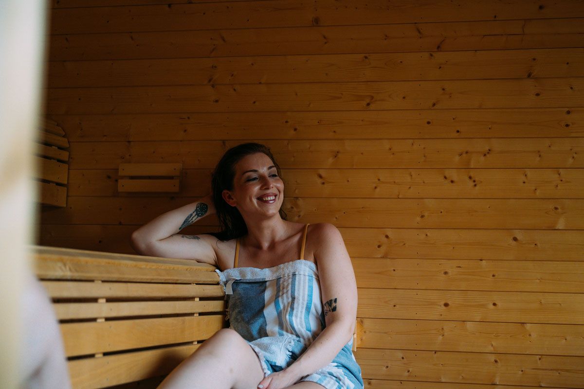 lady in the sauna at Skogen's room