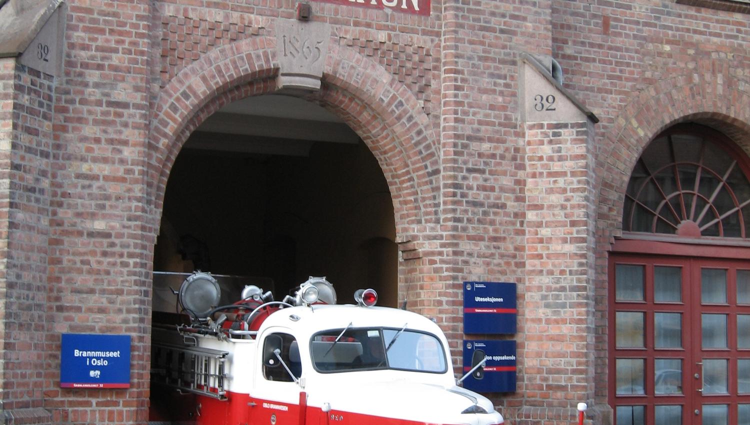 Exterior photo of the museum with a veteran fire truck.