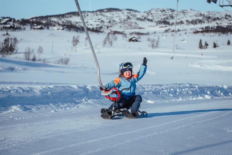 children on a toboggan at Vierli ski centre