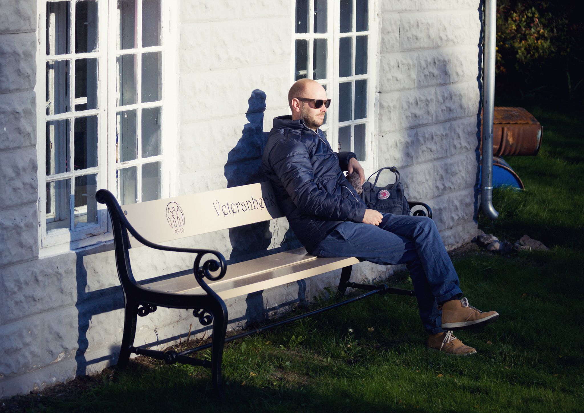 a man sitting on a bench
