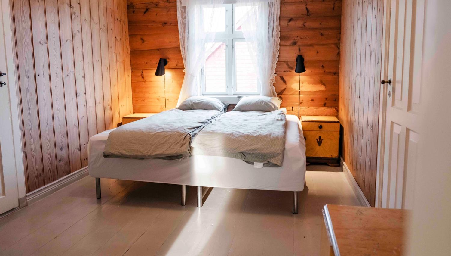 Bright and inviting double bedroom at Stigen Fjordlodge in Hardanger.