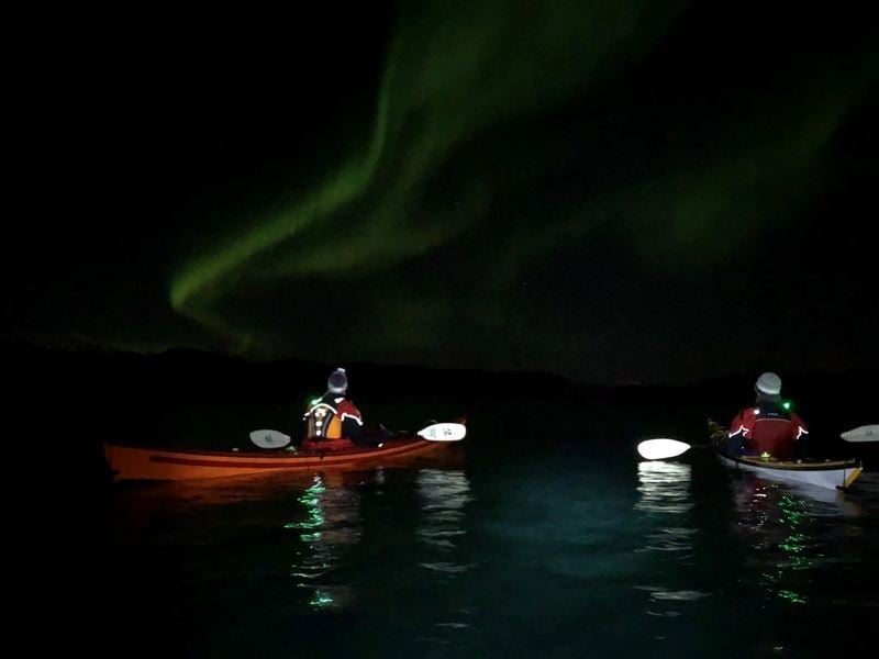 Kayak trip under the northern lights