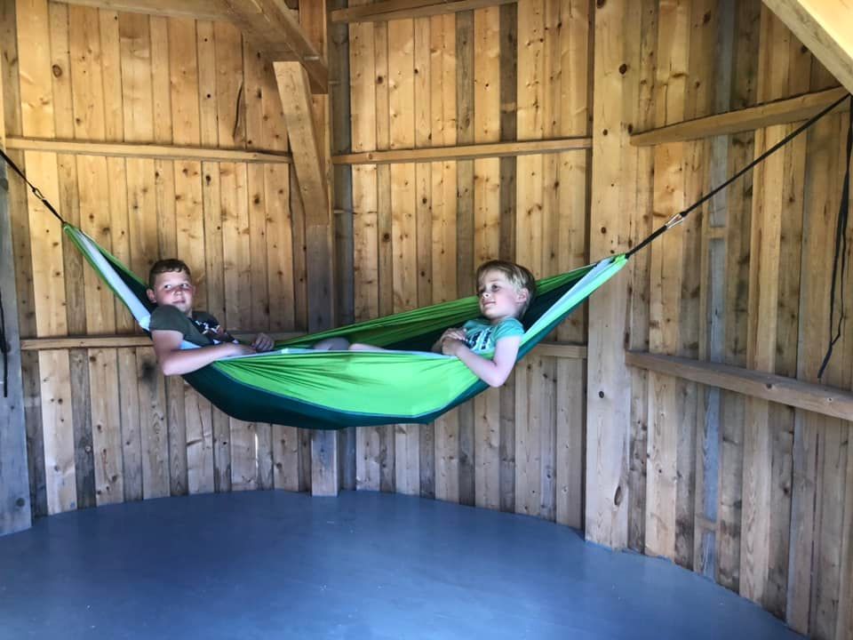 boys inn a hammock 