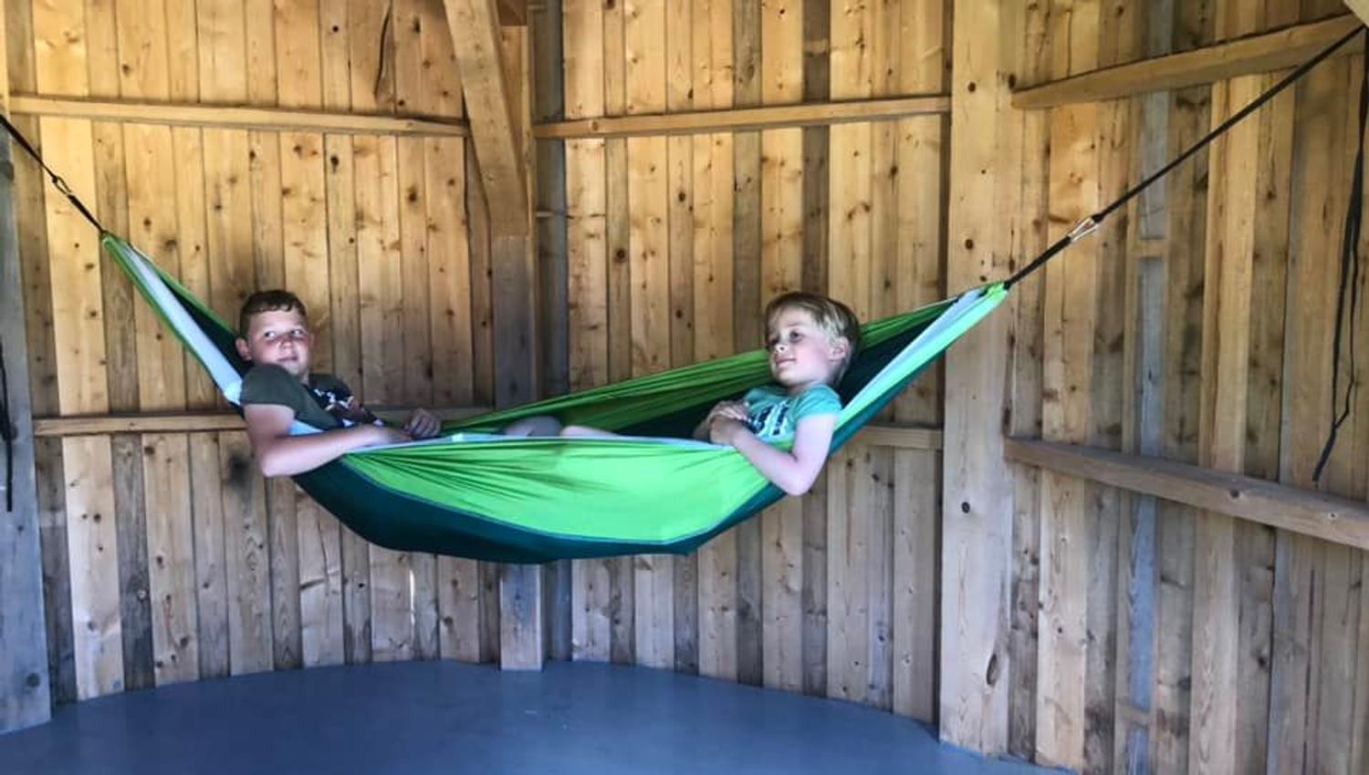 boys inn a hammock