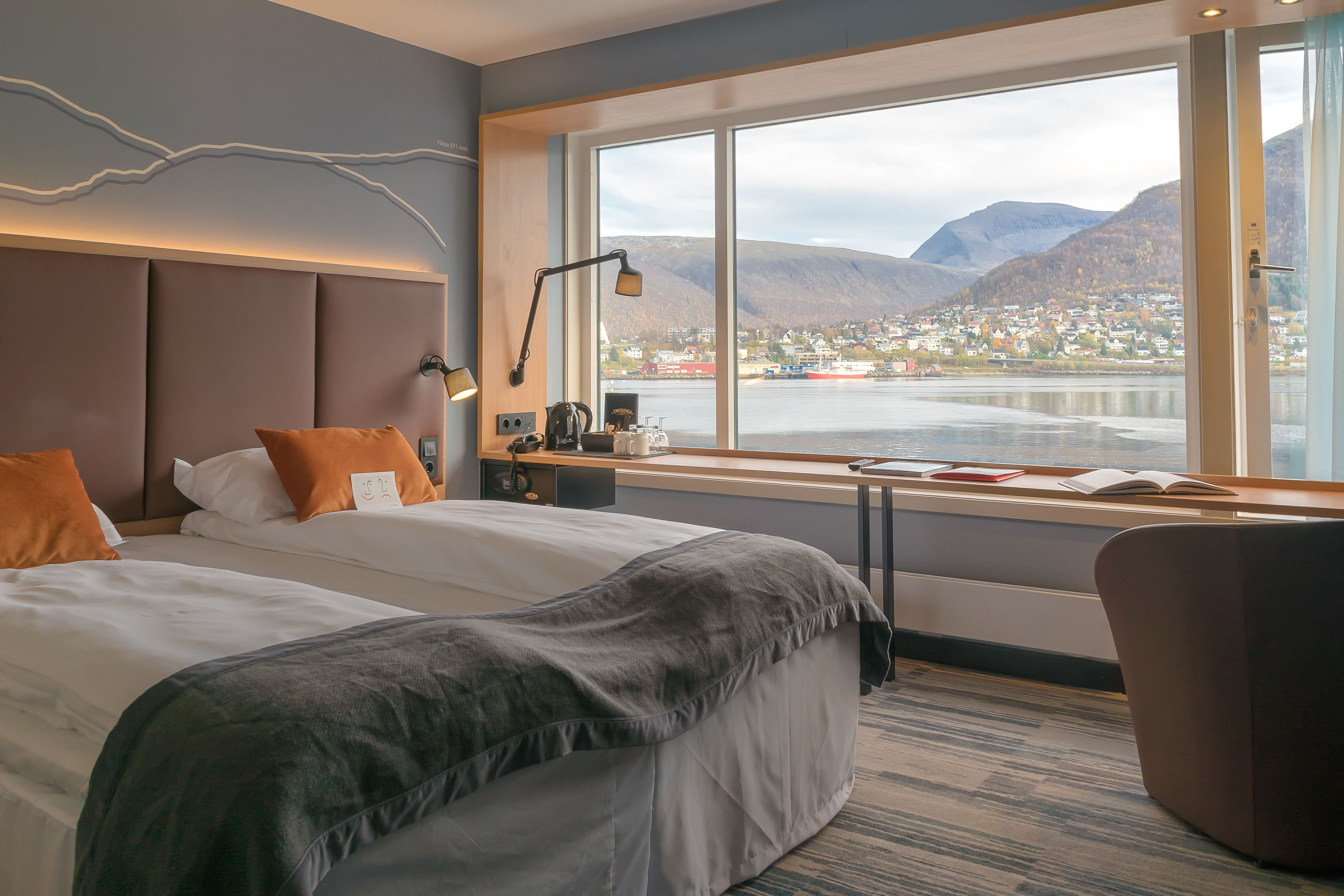 Hotel room with view to fjord and work desk.
