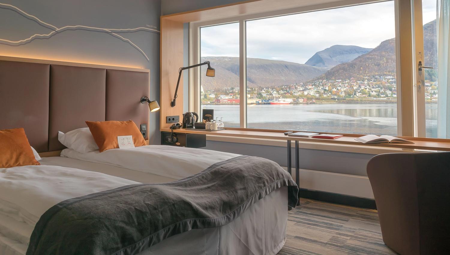 Hotel room with view to fjord and work desk.