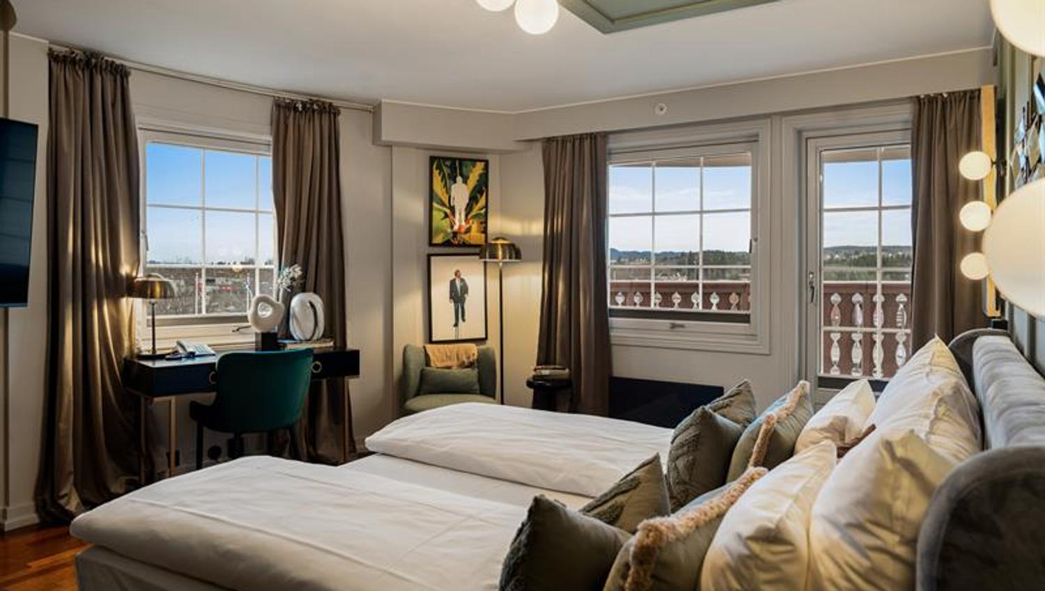 Double bed with view through windows