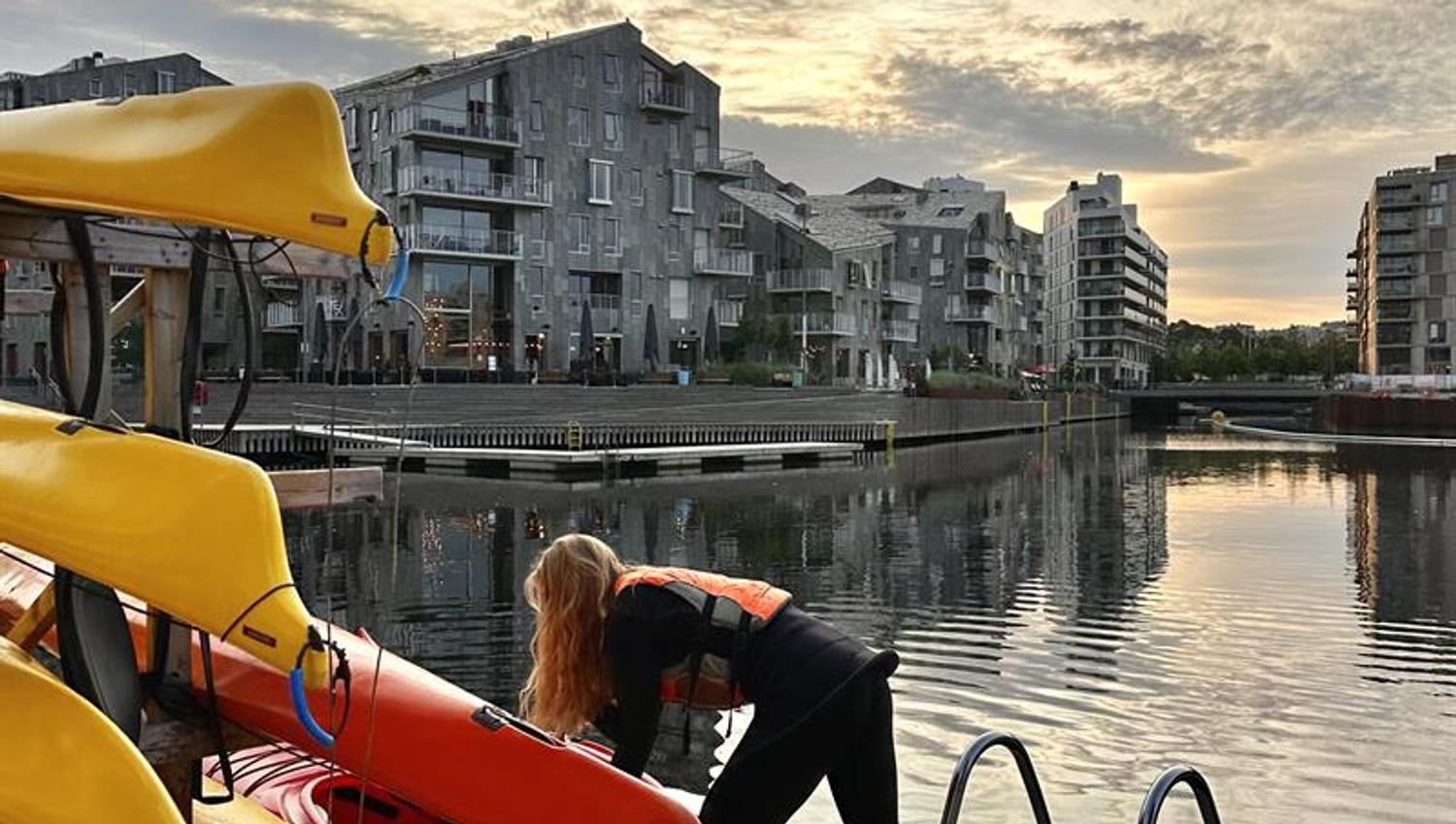 Girl preparing a kayak